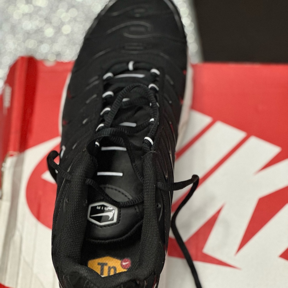 This Nike sneaker was worn once and I got tired of it …very new and in size 11